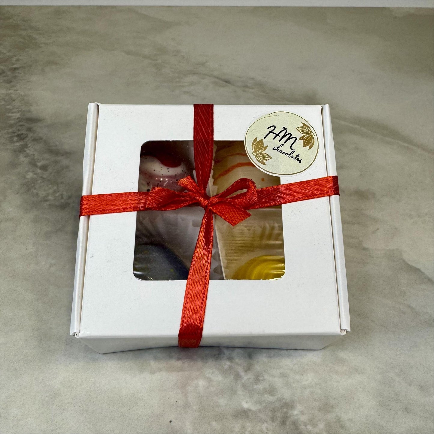 Mini box with 4 Filled Chocolates